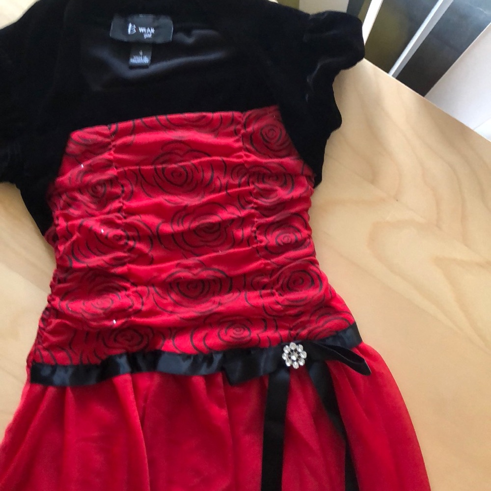It’s a red fancy girls dress